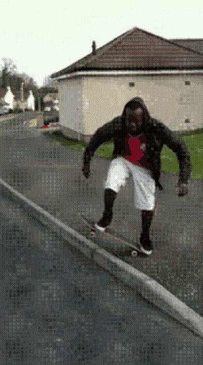 Man Riding Skateboard On Curb GIF