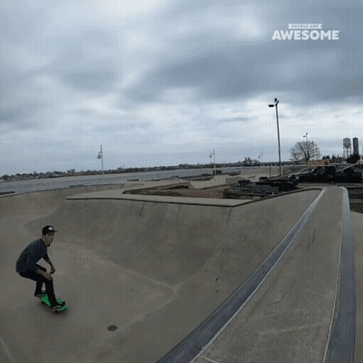 Man Riding Skateboard Saying Awesome GIF