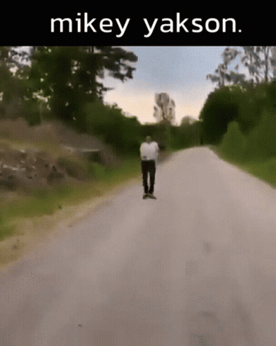 Man Riding Skateboard With Mikey Yakson GIF