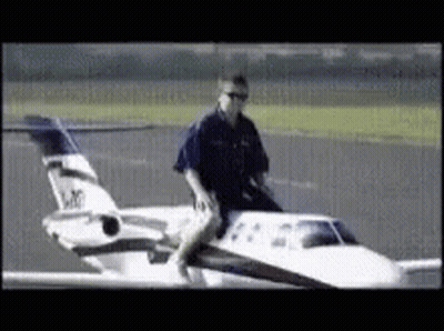 Man Riding Small Airplane N20 GIF