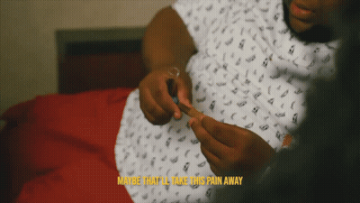 Man Rolling Cigarette Saying Maybe That'll Take This Pain Away GIF