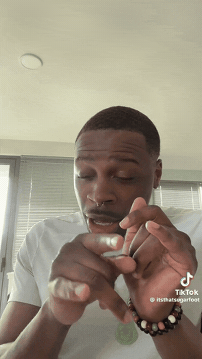 Man Rolling Cigarette TikTok Hashtag GIF
