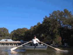 Man Row The Boat Using Two Paddles GIF