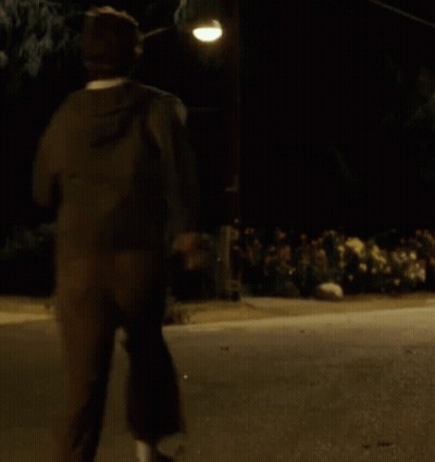 Man Running At Night Under Street Light GIF