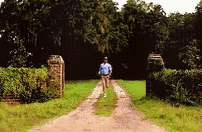 Man Running Down Dirt Road GIF