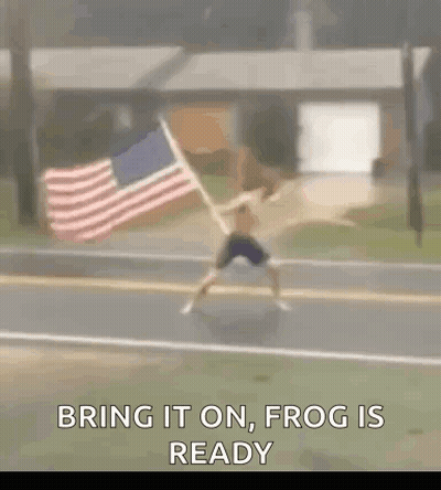 Man Running Down Street With American Flag GIF