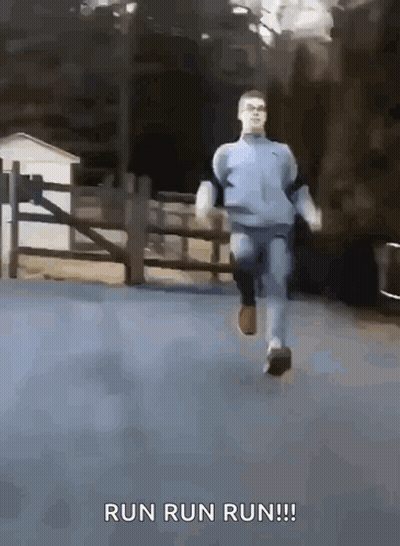 Man Running Down Street With Words Run Run Run GIF