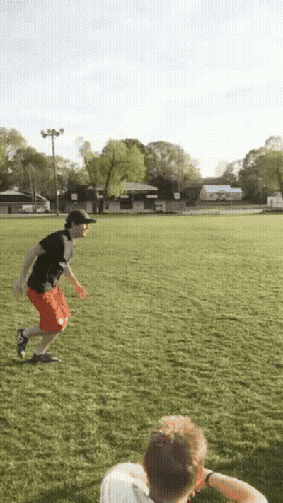Man Running In Black Shirt And Red Shorts GIF