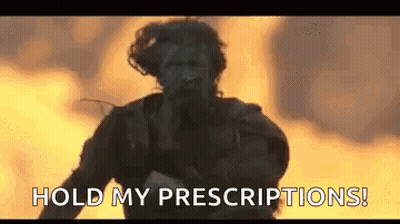 Man Running in Front of Fire Hold My Prescriptions