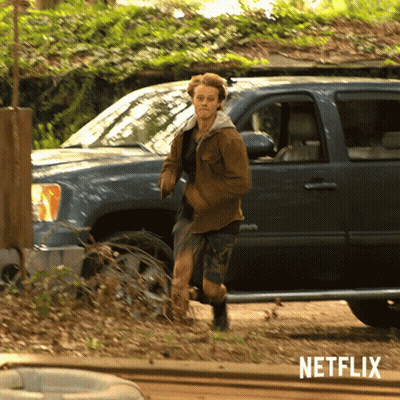 Man Running In Front Of Netflix Vehicle GIF