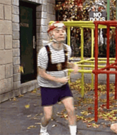 Man Running In Front Of No Dogs Sign GIF