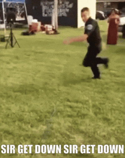 Man Running In Grass Saying Sir Get Down GIF