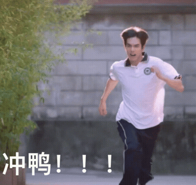 Man Running In White Shirt Near Brick Wall GIF