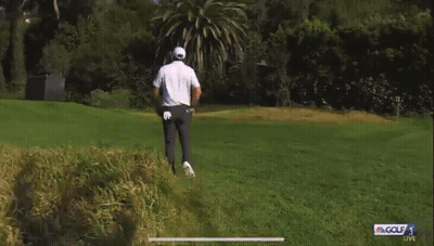 Man Running On Golf Course GIF