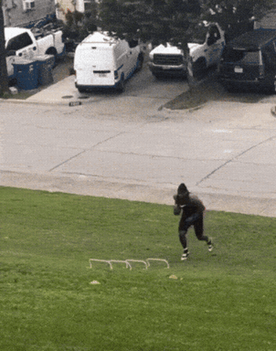 Man Running On Grassy Field With Van GIF