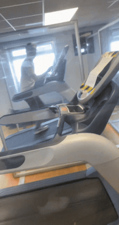 Man Running On Treadmill In Gym GIF