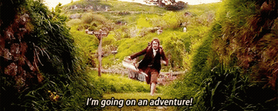 Man Running Through Field Saying I'm Going On An Adventure GIF