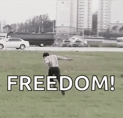 Man Running Through Grass Field With Freedom GIF