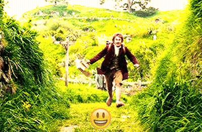 Man Running Through Grassy Field With Smiley Face GIF