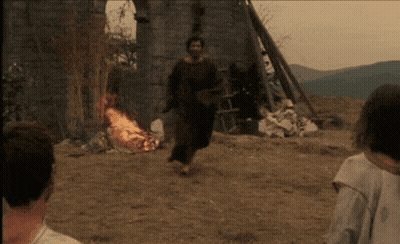 Man Running Towards Burning Fire GIF