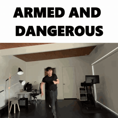 Man Running With Armed And Dangerous GIF