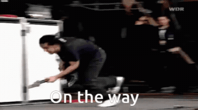 Man Running With Guitar Saying On The Way GIF