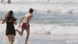 Man's Bad Fall On Funny Beach GIF