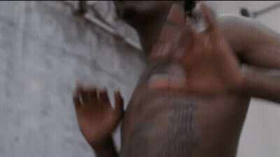 Man's Chest With Die Tattoo GIF