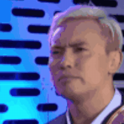 Man's Face Close Up Blue Background GIF