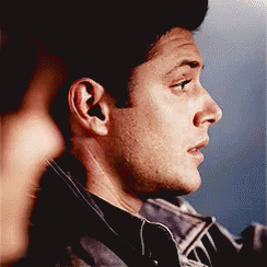 Man's Face Close Up Blue Background GIF