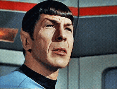 Man's Face Close Up In Blue Shirt GIF