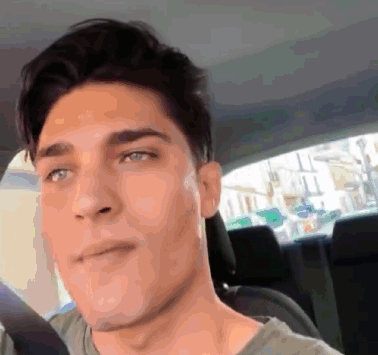 Man's Face Close Up In Car GIF