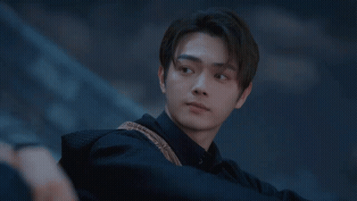 Man's Face Close Up In Dark GIF