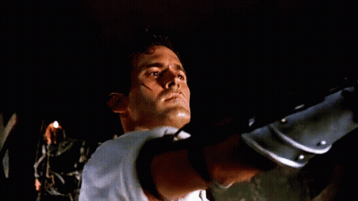 Man's Face Close Up In Dark Room GIF