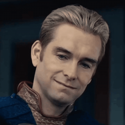 Man's Face Close Up Slight Smile GIF