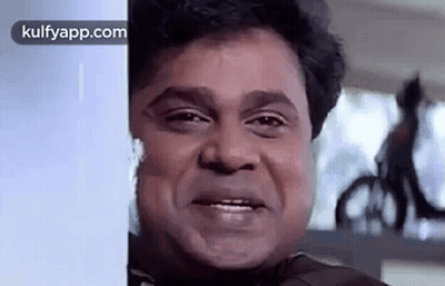 Man's Face Close Up With Bicycle GIF