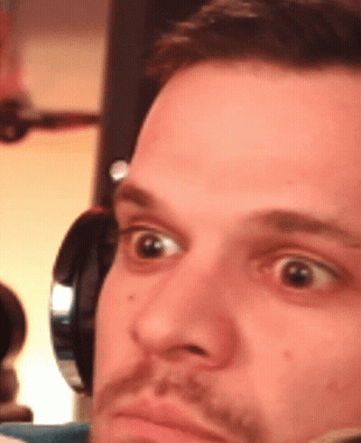 Man's Face Close Up With Headphones GIF