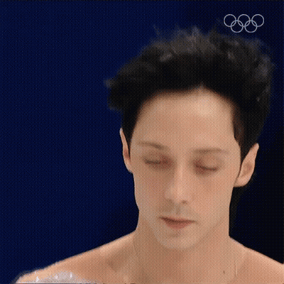 Man's Face Close Up With Olympic Rings GIF