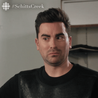Man's Face Close Up With Schitts Creek Logo GIF