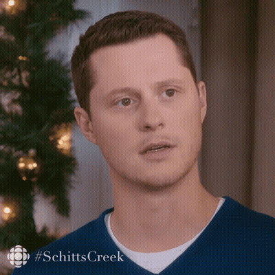 Man's Face Close Up With Schitts Creek GIF