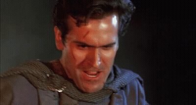 Man's Face Close Up With Sword GIF
