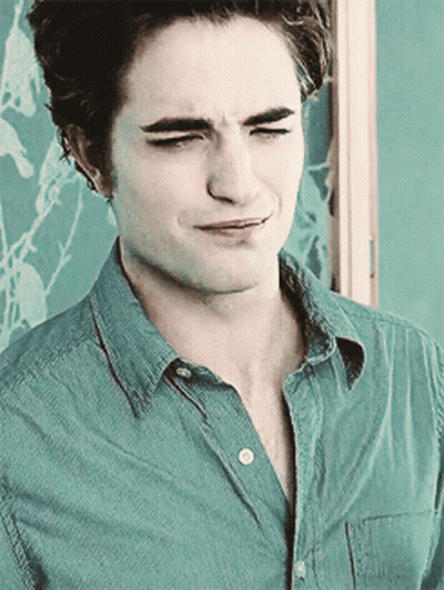 Man's Face In Blue Shirt Close Up GIF