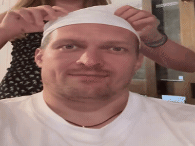 Man's Face In Dark Room GIF