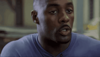 Man's Face In Purple Shirt GIF