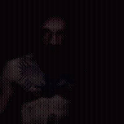 Man's Face In The Dark With Shadow GIF