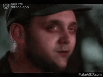 Man's Face Next To Smiley Face GIF
