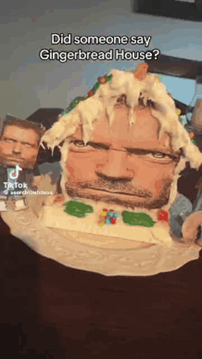 Man's Face On Gingerbread House Cake GIF