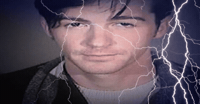 Man's Face With Lightning Behind GIF