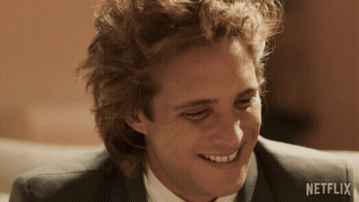 Man's Face With Netflix Logo Behind GIF