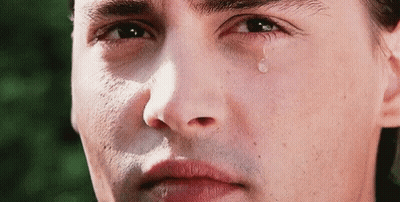 Man's Face With Tear GIF